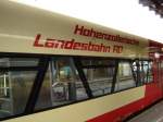 Der Hzl Schriftzug an eine modernen RegioShuttle.