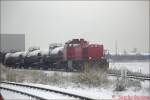 DFG 84127 steht im Januar 2003 mit Kessel- und Containerwagen sowie mir der Zuglok G1206 von Hoyer in Brunsbttel und wartet auf die Abfahrt nach Hamburg-Billwerder. Diese Leistungen hat aber im Frhjar 2003 die Rail4Chem mit ihren eigenen Loks bernommen.