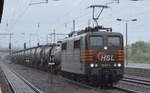 HSL 151 017-1 (NVR-Nummer: 91 80 6151 017-1 D-HSL) mit Kesselwagenzug (geschmolzenes Schwefel) am 30.09.19 Durchfahrt Bahnhof Flughafen Berlin Schönefeld.