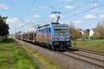 186 381 der HSL führte am 19.04.23 einen mit Toyotas beladenen BLG-Autozug durch Wittenberg-Labetz Richtung Falkenberg(E).