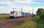 186 430 der HSL schleppte am 17.09.23 einen LKW-Walther-Aufliegerzug durch Wittenberg-Labetz Richtung Dessau.