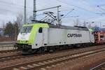 Captrain / ITL  185 581-6 mit einem Autotransportzug bei der Durchfahrt in Berlin Schönefeld Flughafen am 09.03.2017