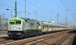 ITL - Eisenbahngesellschaft mbH, Dresden [D] mit  250 007-2  [NVR:  92 80 1250 007-2 D-ITL ] und Schüttgutwagenzug (leer) am 24.02.21 Durchfahrt Bf. Flughafen BER Terminal 5.