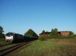 250 006 mit ihrem Zug im Bahnhof Pritzwalk.