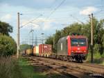 Bei bestem Licht schleicht 481 002-4 der ITL mit einem Containerzug aus Hamburg-Waltershof durch Hamburg-Moorburg Richtung Maschen via Kattwykbrcke und Hohe Schaar.