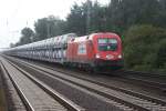 1116 235-1 der ITL fuhr mit einem Audi-Transportzug am 05.09.2009 in Richtung Wunstorf.Fotografiert am S-Bahnhof Dedensen/Gmmer.