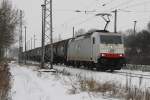 E186 138 mit Kesselwagen nach Stendell in Passow am 19.01.2010