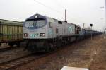 250 007-2 der ITL zieht einen Gterzug mit Waggons der Firma  AX Benet  durch Rathenow. 17.03.2010