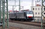 ES 64 F4 212 der ITL fhrt am 14.03.10 aus dem Rbf Halle(S) kommend am Hbf Halle(S) vorbei.