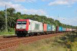 Am 27.August 2012 durchquerte ITL 185 598 mit einem Containerzug Berlin-Friedrichshagen Richtung Westen.