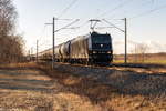 185 546-9 MRCE Dispolok GmbH für LEG - Leipziger Eisenbahnverkehrsgesellschaft mbH mit einem Kesselzug in Nennhausen und fuhr weiter in Richtung Wustermark.