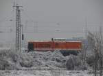 Locon-Lok 212 (DR-V100) hlt hier ihre besinnliche Weihnachtsruhe im winterlichen Bahnhof Kehl am Rhein.