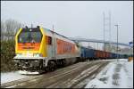 Locon 401 rangiert mit einem Gipszug aus Peitz/Ost am 30.11.2010 im Stralsunder Sdhafen.