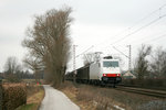 Locon 186 144 mit einem Ganzzug aus Schiebewandwagen am 28.02.2009 in Pulheim.