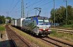 Lokomotion Siemens Vectron 193 773-9 mit KLV Zug in München Trudering am 11.08.20 vom Bahnsteig aus fotografiert