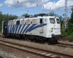 139 177-0(Lokomotion)wartet im Bahnhof Rostock-Bramow auf den Holzzug von Rostock-Bramow nach Stendal-Niedergrne.Aufgenommen 31.07.09