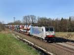 Die 186 102 am 02.04.2011 mit einem Autozug unterwegs bei Hilperting.