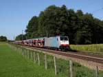 Die 186 104 mit einem Autozug am 03.09.2011 unterwegs bei Vogl.