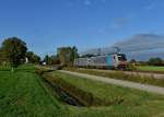 186 287 + 186 288 mit einem fast leeren Containerzug am 13.10.2013 bei bersee.