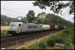 Am Ortsrand von Hasbergen ist hier die Metrans 386003-8 am 11.07.2019 um 10.38 Uhr mit einem Container Zug in Richtung Ruhrgebiet unterwegs.