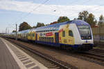 RE3 Zug nach Hamburg Hbf bei der Durchfahrt in Ashausen.