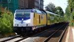 Der von 246 005-3 gezogene metronom aus Cuxhaven nach Hamburg Hbf erreicht hier den Bahnhof der Hansestadt Stade.