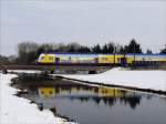 Metronom ME 80943 Hamburg - Uelzen bestehend aus Doppelstockwagen der neuesten Generation beim berqueren der Luhe; Winsen, 04.01.2010  