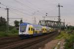 Metronom nach Hamburg Hbf in Veddel (Ballinstadt) am 18.08.2011