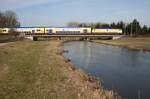 ME 146-02 mit ME 80947 (Hamburg–Uelzen) am 18.03.2010 auf der Luhebrcke in Winsen (Luhe)