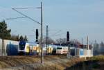 Zugkreuzung ICE 79 Hamburg-Altona - Zürich und Metronom ME 82122 Uelzen - Hamburg Hbf; bei Winsen, 17.01.2015  