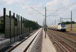 ME 146-02 mit ME 82122 (Uelzen–Hamburg Hbf) am 30.06.2012 in Bardowick; links das bereits vollstndig errichtete, aber noch nicht befahrene 3.