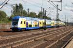 D-ME 55 80 86-73 204-4 am 13.08.2014 an der Spitze eines metronom Leerzug nach Hamburg Hbf bei der Einfahrt in Harburg.