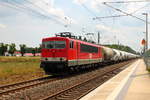 Die Lok 704 der MEG (NVR-Nummer: 91 80 6155 195-1 D-MEG) mit einem Kalkzug am 10.06.2018 in Nassenheide.