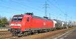 Hinten dran noch  145 029-5  [NVR-Nummer: 91 80 6145 029-5 D-DB] der MEG - Mitteldeutsche Eisenbahn GmbH, Schkopau [D] am Haken von  266 442-3  mit Zementstaubzug (leer) Richtung Rüdersdorf bei