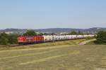 MEG 704 (155 195) und MEG 605 (143 344) mit dem Zementzug am 21.07.2013 bei Plling.