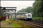 Auf dem Weg zur großen Fahrzeugschau in Osnabrück kommt hier am 3.9.2006 der MWB Taurus 1116.912 mit einer Rheingold Garnitur durch den Bahnhof Natrup Hagen.