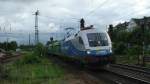 1116 912 der Mittelweserbahn (MWB) fuhr am 1.6.2007 mit einem Hackschnitzelzug aus Kehl durch Rastatt Richtung Norden.