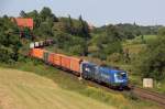 Mittelweserbahn (MWB) 1116 911-7 zieht am 14.08.12 einen Containerzug durch das Leinetal.
Festgehalten bei Elze.