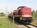 Am 11. Mai 2012 passiert 204 347-9 (202 347-1) und eine Schwesterlok der  MTEG - Muldental Eisenbahnverkehrsgesellschaft mbH den Bahnbergang in Knigs Wusterhausen, Fichtestrasse mit einem Gterzug. 