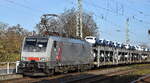 NeS - Netzwerkbahn Sachsen GmbH, Dresden [D] mit der Akiem Lok  189 101  [NVR-Nummer: 91 80 6189 101-9 D-AKIEM] und einem PKW-Transportzug am 26.11.24 Höhe Bahnhof Magdeburg Neustadt.