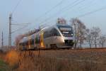 Der VT 0013-T2 (95 80 0643 621-5 D-NEBB) der Niederbarnimer Eisenbahn (NEB) auf der RB 12 von Templin Stadt nach Berlin Ostkreuz am 16.12.2015 in Nassenheide.