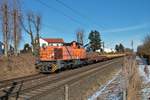 Northrail 275 103-0 in Darmstadt Kranichstein mit Flach- und Weichenwagen am 14.02.21