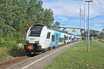 Der RE9 der ODEG nach Stralsund Hbf beim Zwischenhalt im Bahnhof Stralsund-Rügendamm.