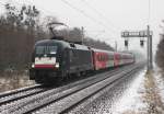 Berlin-Lichterfelde Ost am 23.12.2012 - ES64U2 097 zieht einen RE4 nach Ludwigsfelde.