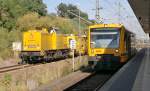 Ein RegioShuttle der ODEG und ein Instandsetzungszug der DB Netz AG im Bahnhof Jterbog am 02.10.2012.