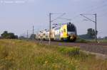 ET 445.111 (445 111-8) ODEG - Ostdeutsche Eisenbahn GmbH als RE2 (RE 37374) von Wismar nach Paulinenaue in Vietznitz.