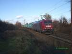 185 534 am 1.12.2007 mit einem Containerzug durch LImmer.