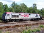 OHE RedTiger 330094 steht mit einen leeren Holzzug in Munster (14.06.10)