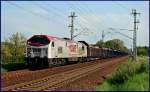 330094 -OHE- Ur-Tiger mit Stammholz unterwegs nach Wismar.