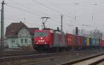 186 133-5 mit Containerzug in Richtung Norden.